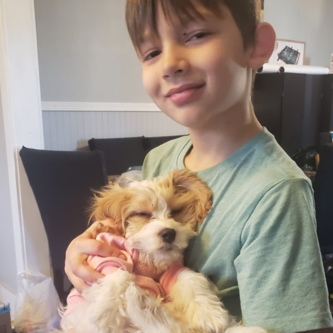 Jacob with puppy named Peaches