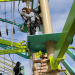 boy on a ropes course