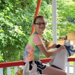 Teenage girl with bronchio-pulmonary dysphagia and cerebral palsy enjoyes dream trips to Story Land and Great Wolf Lodge.